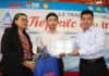 Mai Văn Thiên (giữa) tại Lễ trao học bổng Tiếp sức đến trường của Báo Tuổi trẻ ngày 4/9/2018